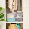 imageIRIS USA 15 Qt Plastic Basket Storage Bins with Lids Medium 4Pack Stackable Lidded Storage Organizer Bins for Kitchen Bathroom and Bedroom Off WhitePearl
